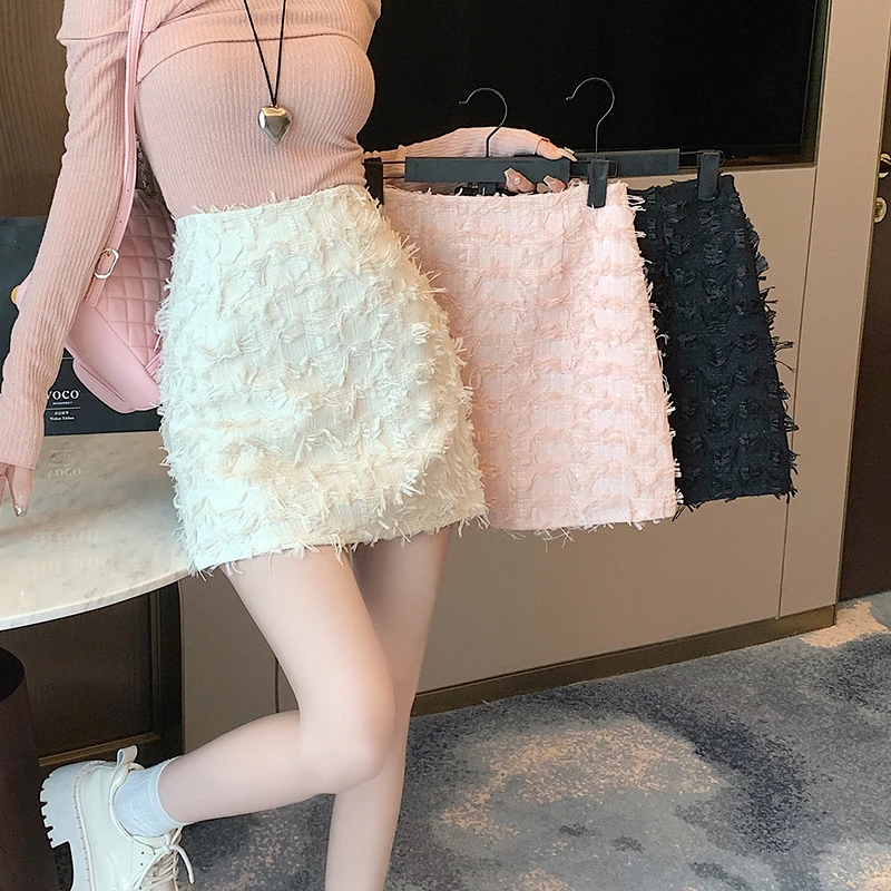 小香风粉色半身裙女秋季小个子a字包臀裙高腰显瘦设计流苏一步裙