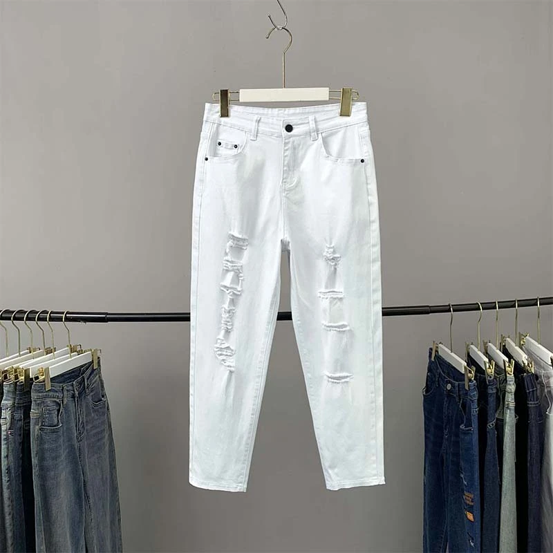 遮垮白色破洞牛仔裤女秋新款大码高腰显瘦弹力宽松哈伦小脚萝卜裤