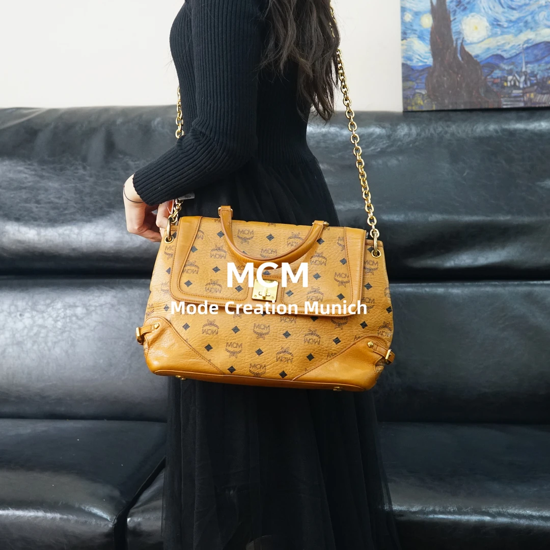 95新 MCM 干邑色翻盖斜挎包/WJ12605035/5035