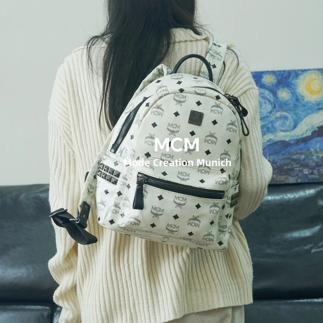 95新 MCM 黑白双肩包/WJ11609549/9549