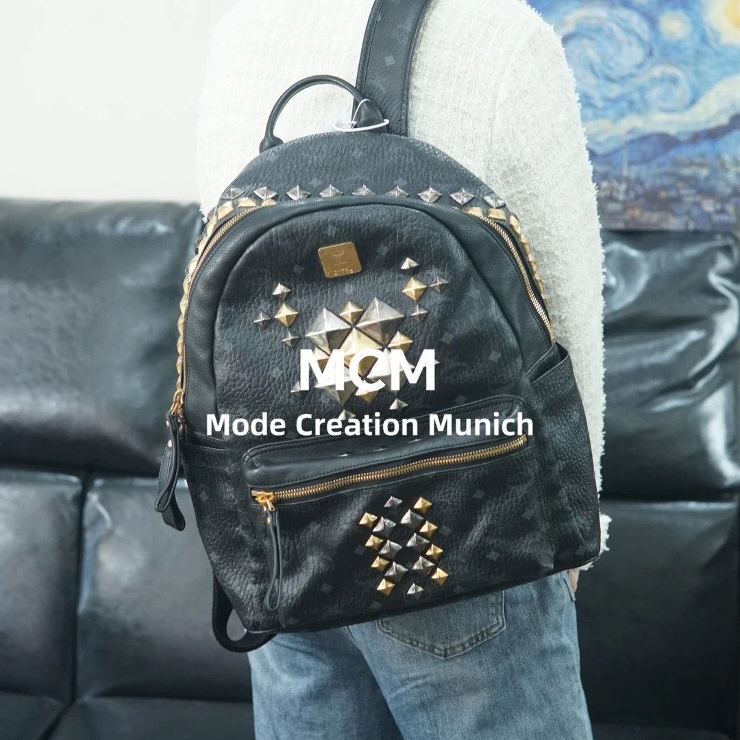 95新 MCM 黑金双肩包/FYSD09715008/5008