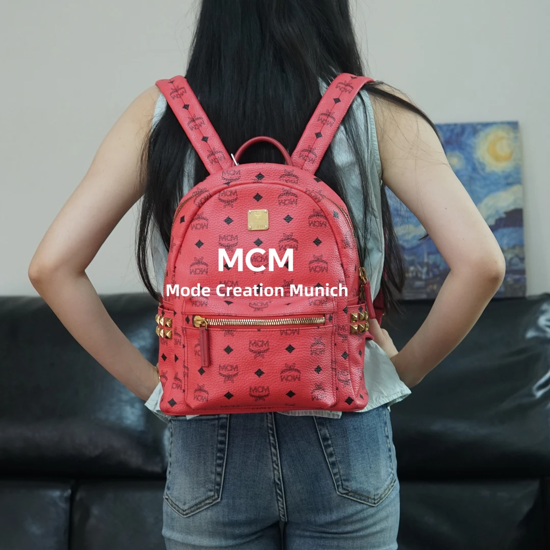 95新 MCM 茄红双肩包/ZS09606027/6027