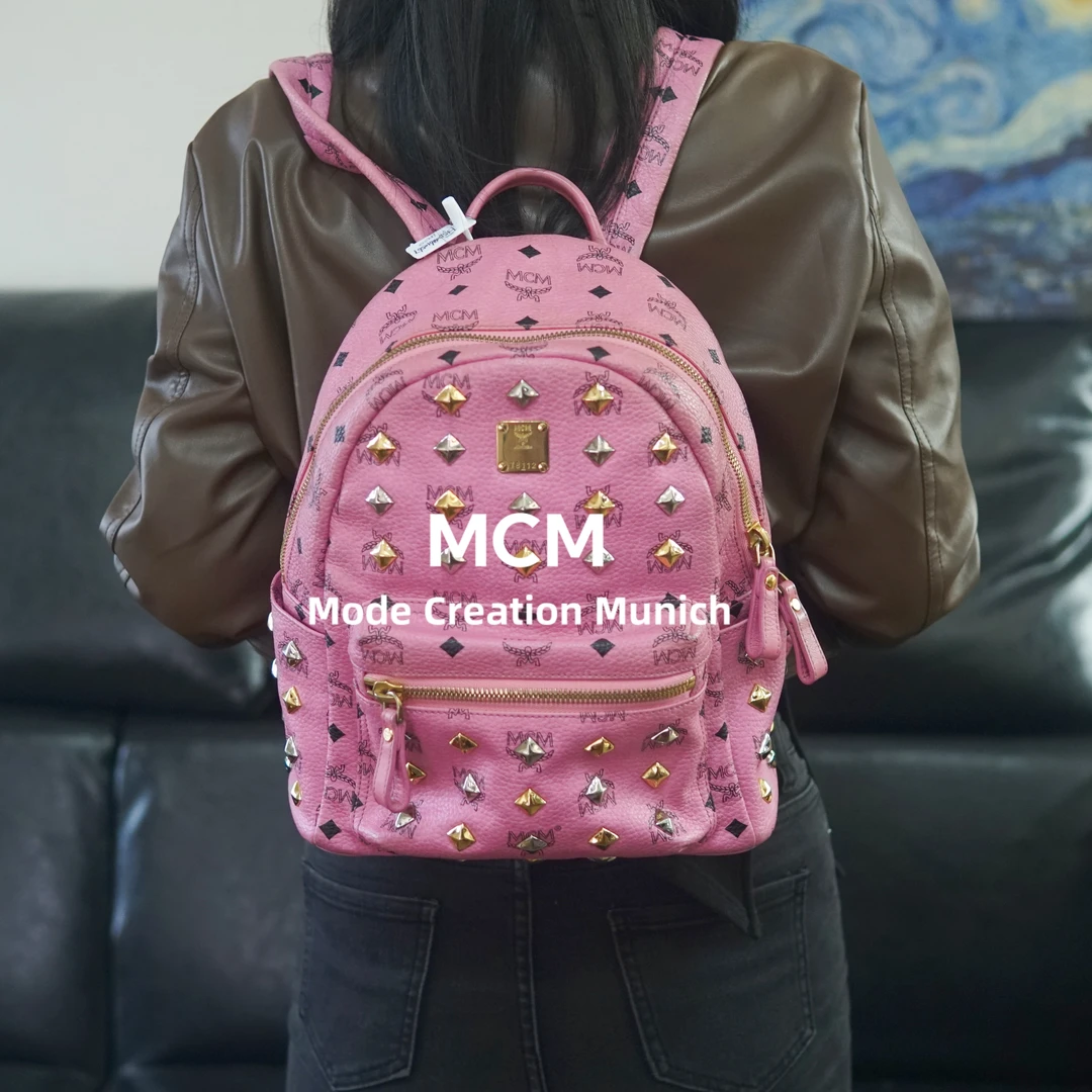 95新 MCM 粉色双肩包/F3SD08610567/0567