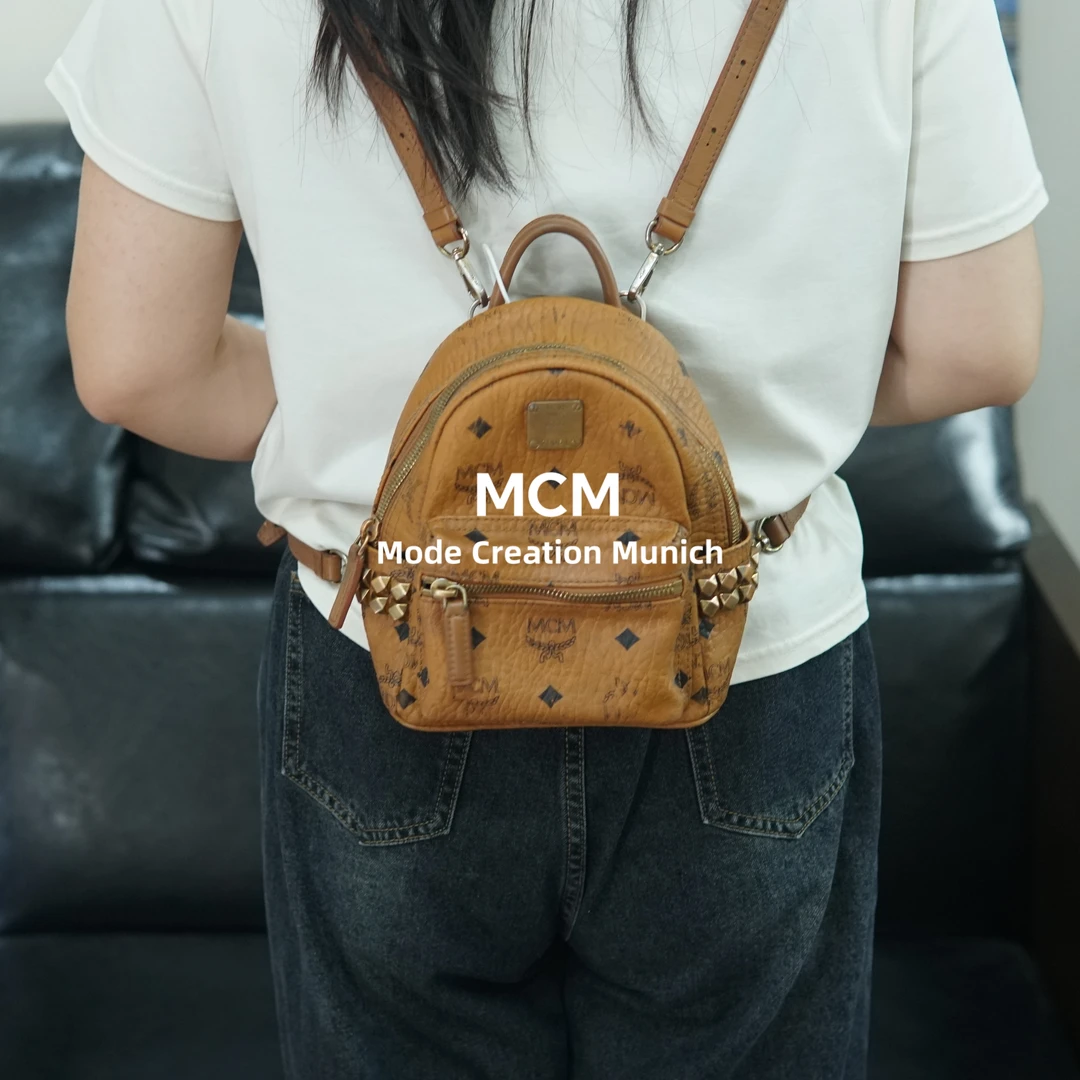 95新 MCM 干邑色双肩包/SP09619021/9021