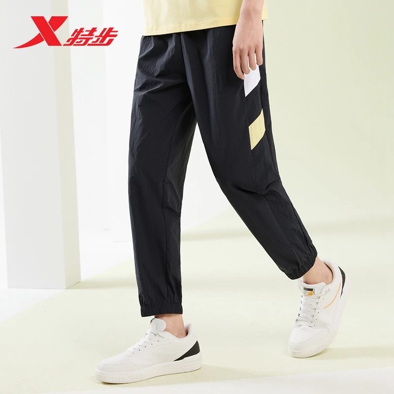 XTEP/特步夏季宽松薄款运动休闲长裤束脚男裤透气休闲裤男士弹力