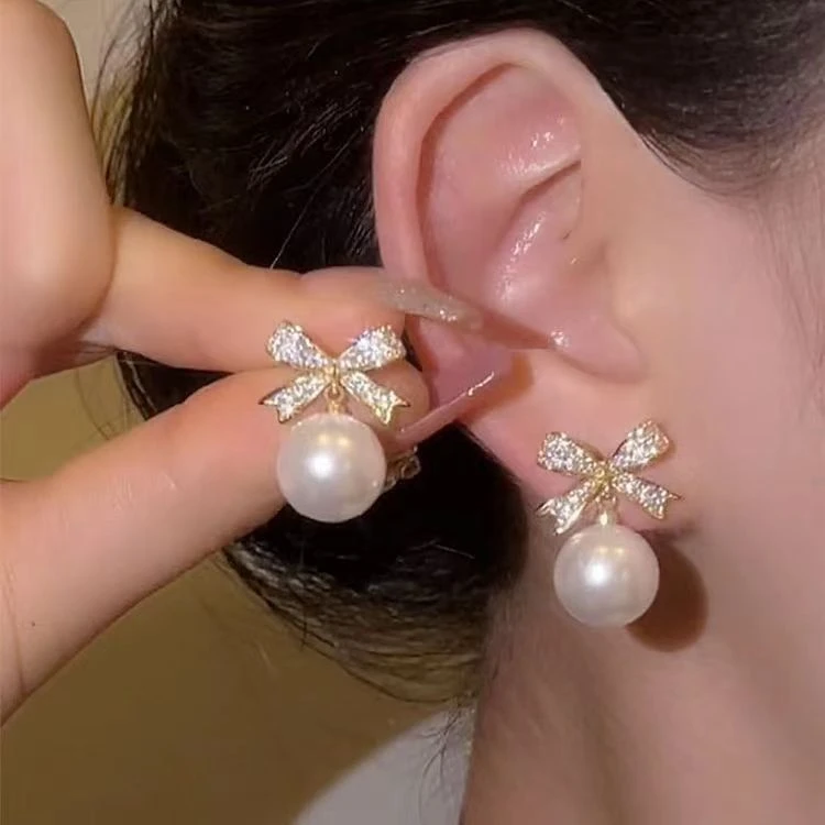 合金耳饰 【新疆包邮】轻奢气质百搭时尚珍珠蝴蝶结耳钉-R006