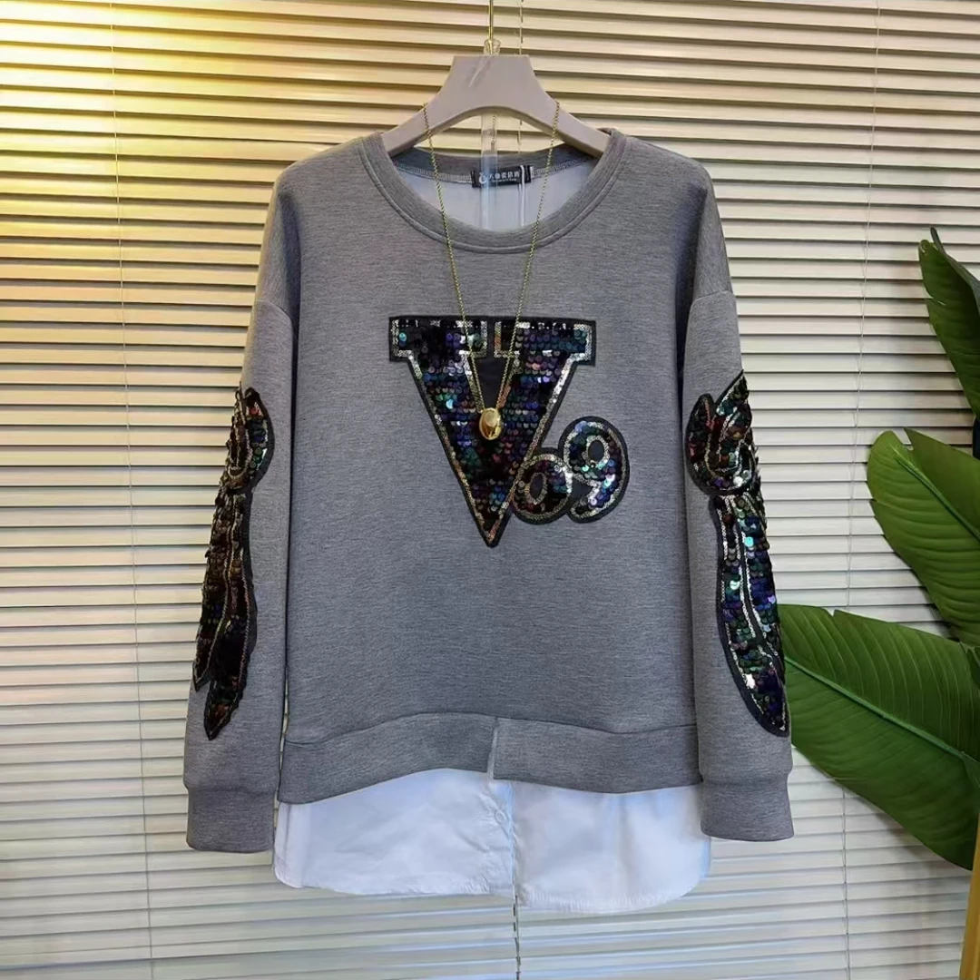 8276秋季新款假两件套拼接重工亮片空气棉卫衣