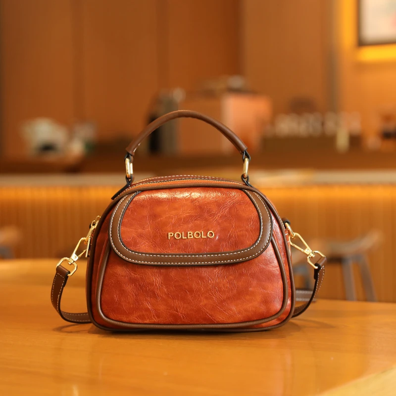 香港女款包2025夏季新款复古单肩手提小圆包女士时尚斜挎小包包女