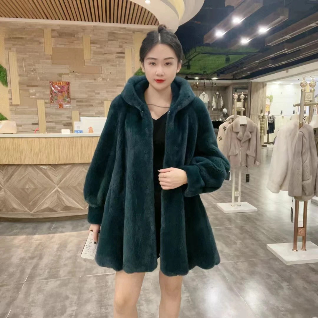 盛亚雪加厚肩下浪中长女款外套