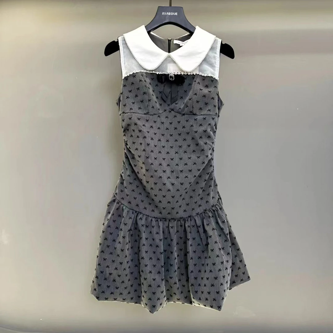 法式甜美蕾丝蝴蝶结波点连衣裙女夏季高级感收腰花苞短裙