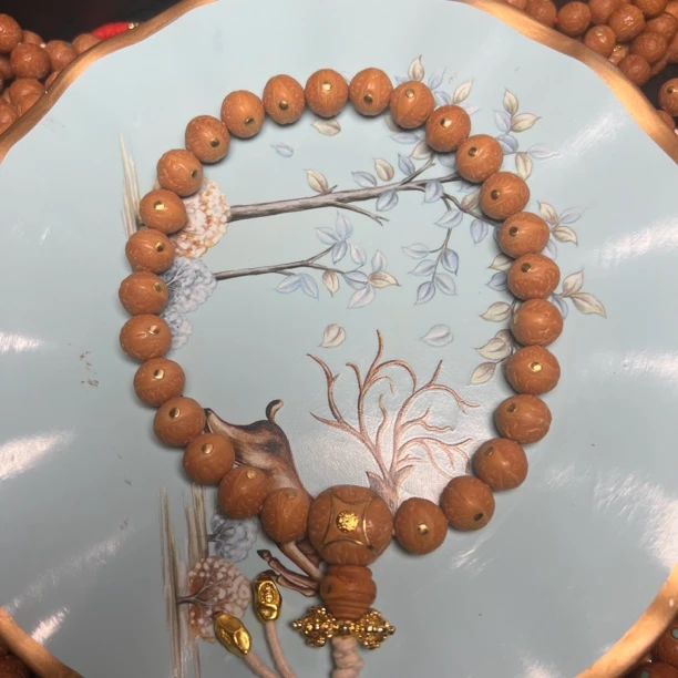 12+精品凤眼菩提手持镶嵌铜钉（商品以实物为准）