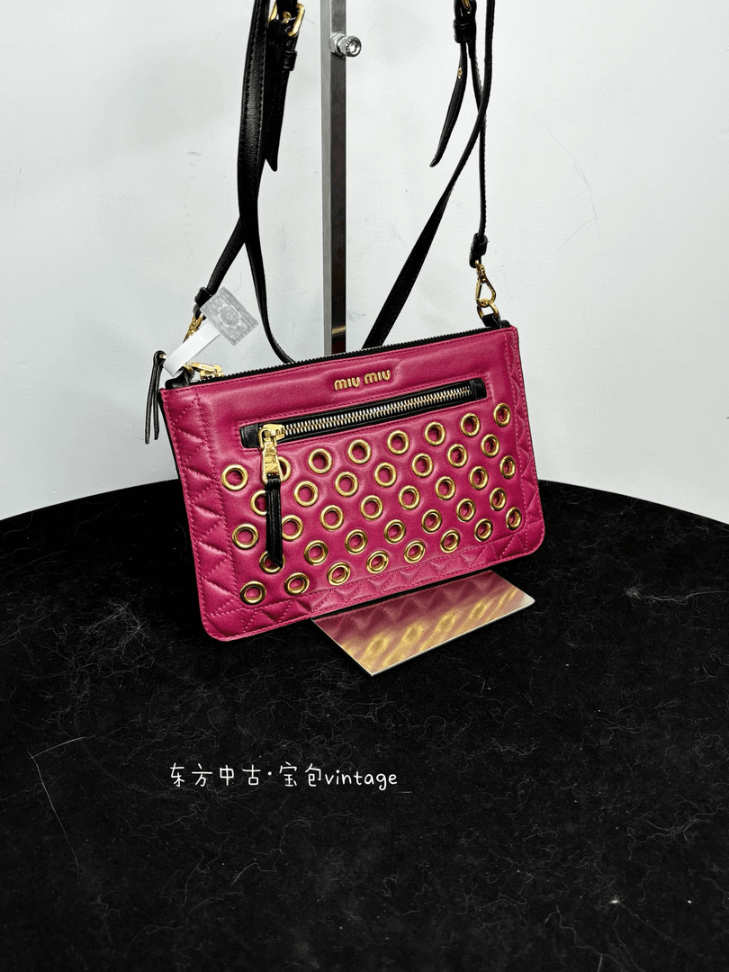 95新 MIU MIU/缪缪 （K）miumiu 粉色铆钉斜挎包