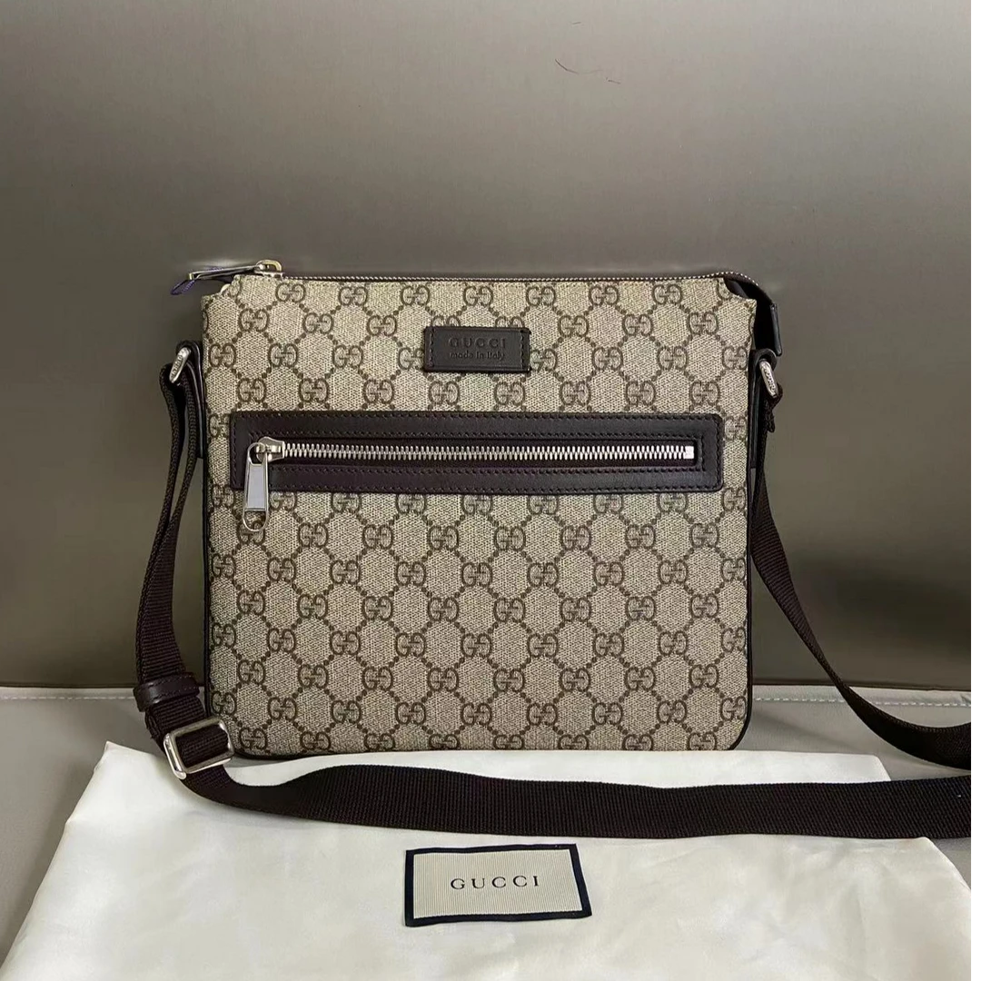 99新 GUCCI/古驰 98新棕花拼皮拉链邮差包zp081
