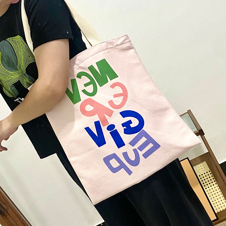 别叮一专属春天小众字母帆布包夏季百搭单肩包学生拉链购物袋