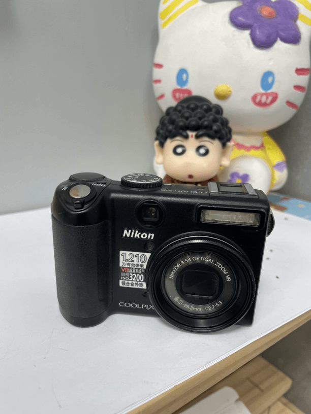 95新  尼康p5100/1210w 3.5x 滤镜模式多 拍人拍景都好看