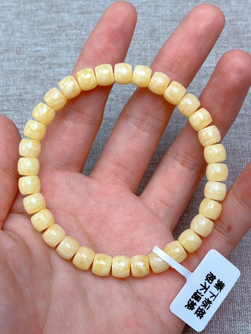 HBHZQSC-黄白花直切手串