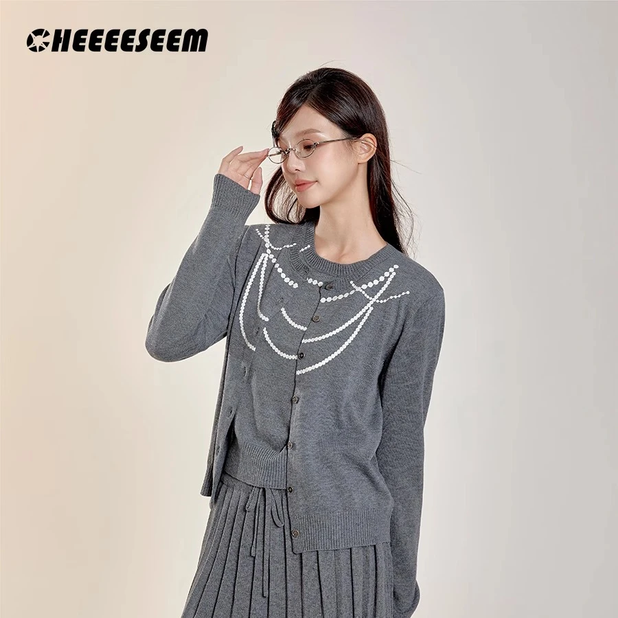【雪宝粉丝专享】cheeeeseem烫银项链针织背心开衫针织毛衣两件套