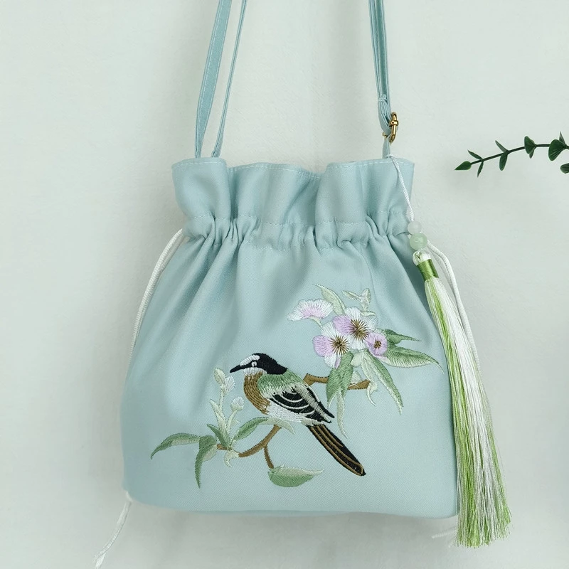 新款刺绣汉服抽绳水桶包中国古风斜跨包文艺复古斜挎水桶手机包