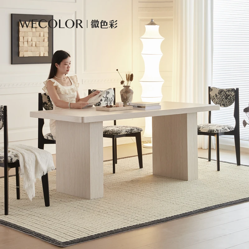 法式复古奶酪餐桌洞石岩板现代中古侘寂风家用小户型奶油风餐桌