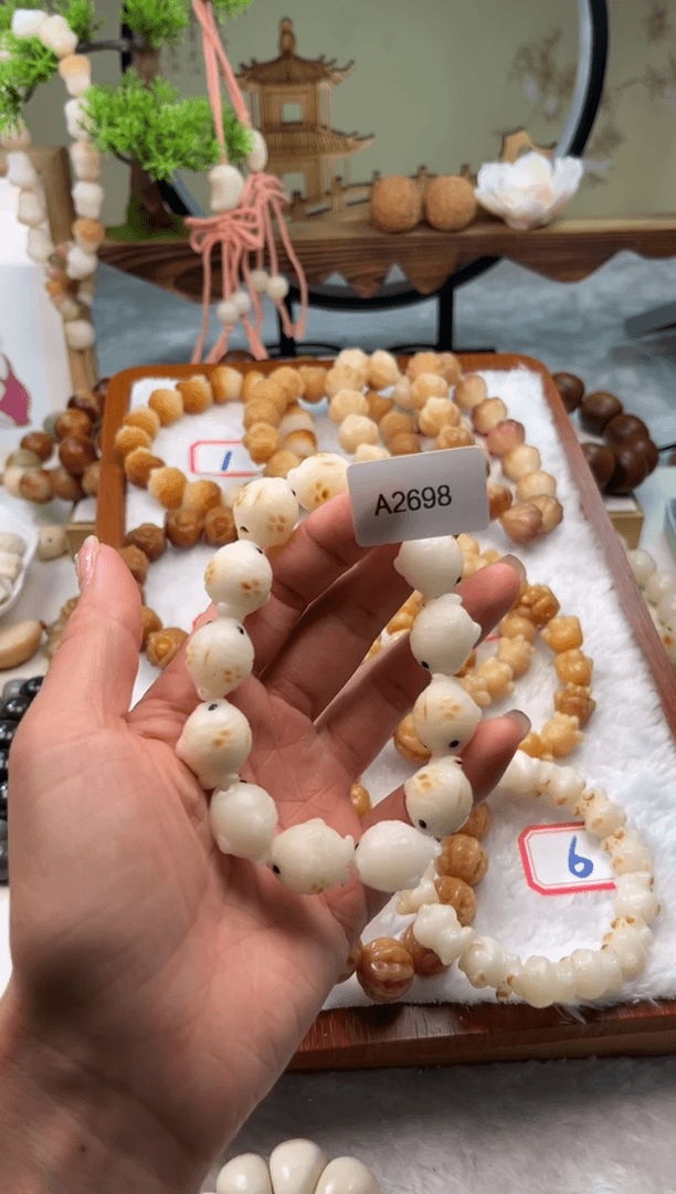【闪购商品】菩提根/象牙果手串15MM通货碳烧鱼