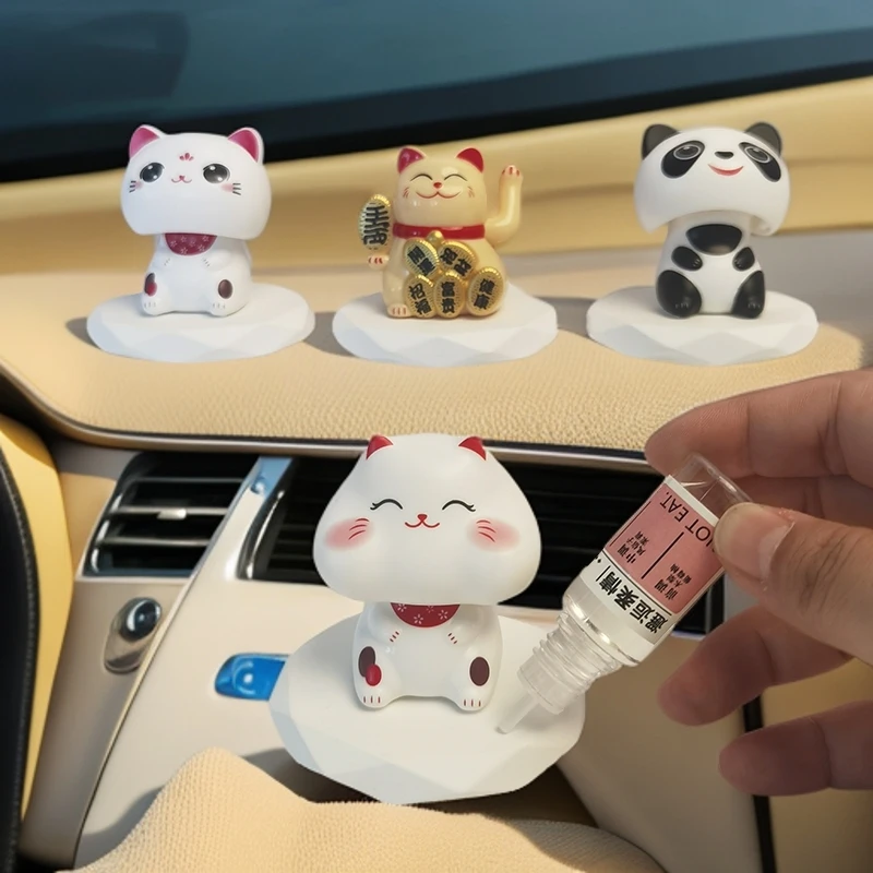 车载香薰仪表台摆件太阳能招财猫可爱摇头精油香水扩香石膏家用饰