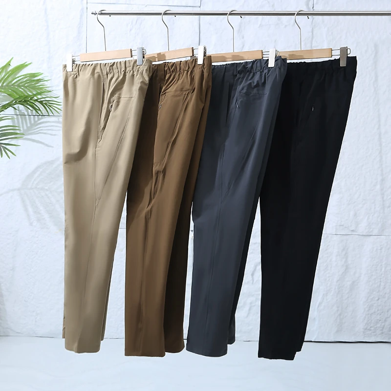 压胶防风防泼水高端内里微弹男士户外冲锋裤软壳裤休闲长裤23141-