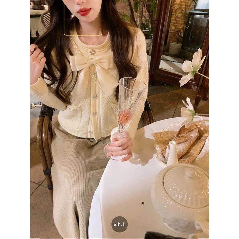 新款时尚慵懒风减龄蝴蝶结毛衣外套少女风小众百搭开衫81345#0.1