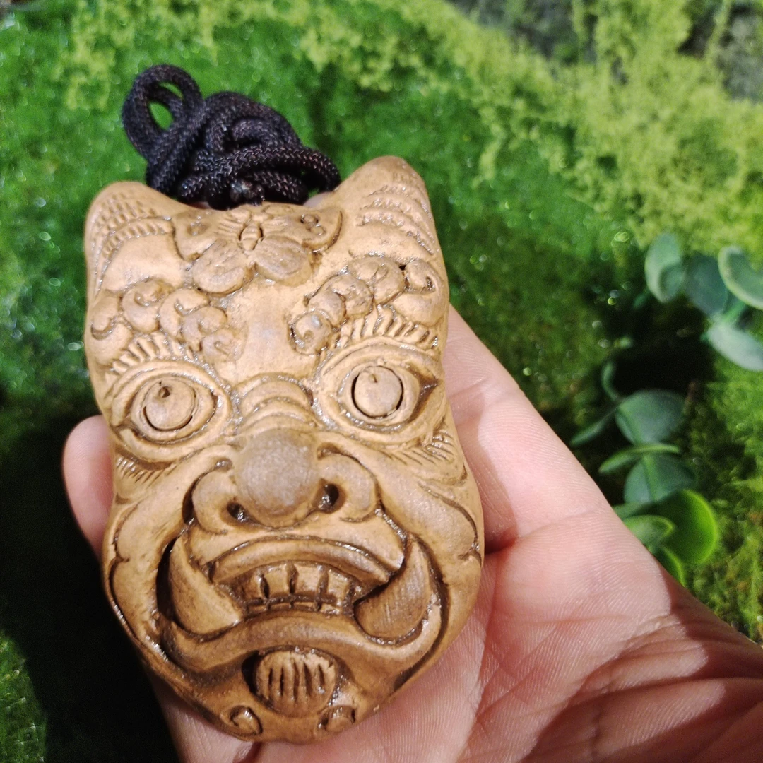 手工捏制傩面傩佑平安