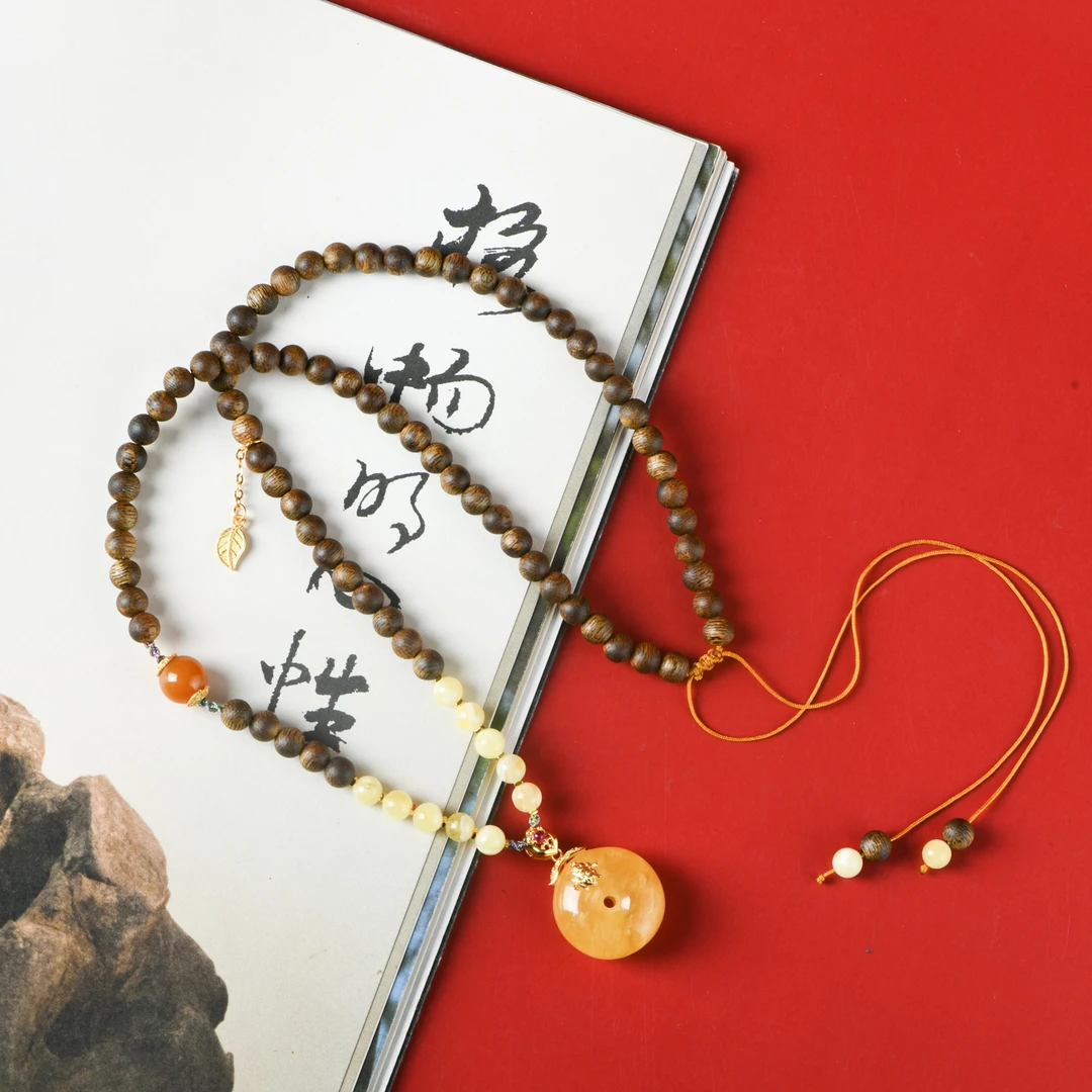 （木带宝）沉香白奇0.5平安扣脖挂