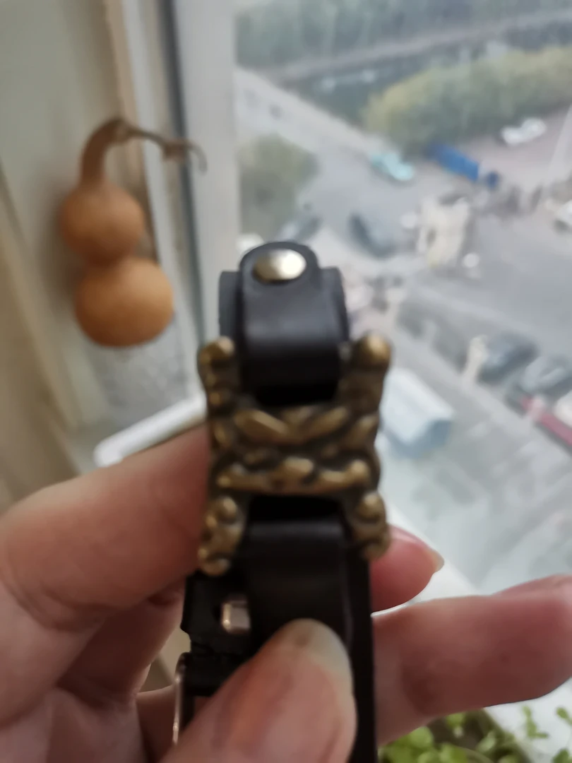 经书扣小饰品，铜制，规格：1.9*2.3（cm）