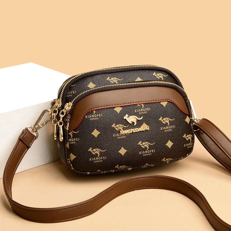 真皮袋鼠印花时尚百搭网红单肩斜挎包2023新款女士包多层手机包