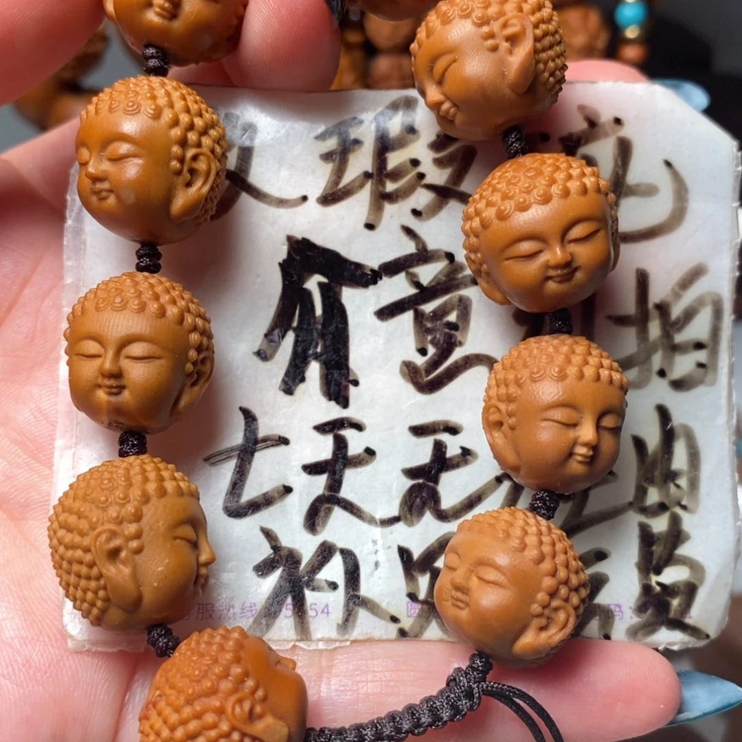 橄榄核核雕宝宝佛头