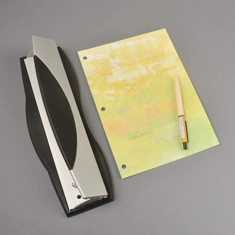 【124】本册纸张打孔器
