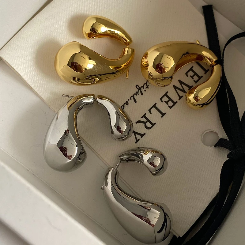 铜合金耳饰 网红爆款水滴耳环女个性轻奢前后佩戴银针耳钉2024新