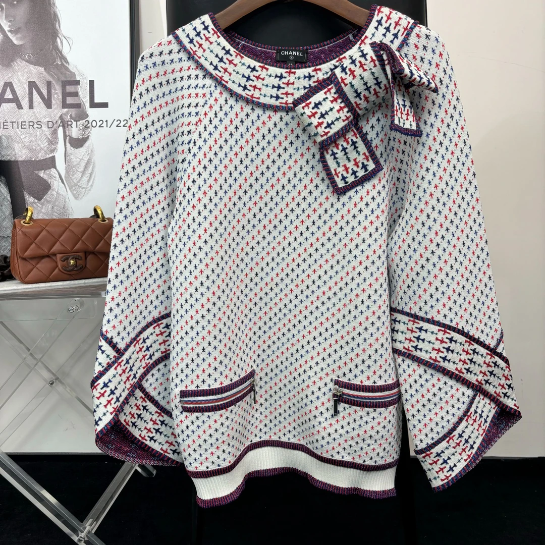 Chanel16s蓝色机场系列蝴蝶结针织套装 38码