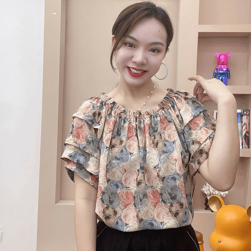 泡泡袖女碎花显瘦洋气时尚气质夏季印花短袖一字领小衫遮肉宽松