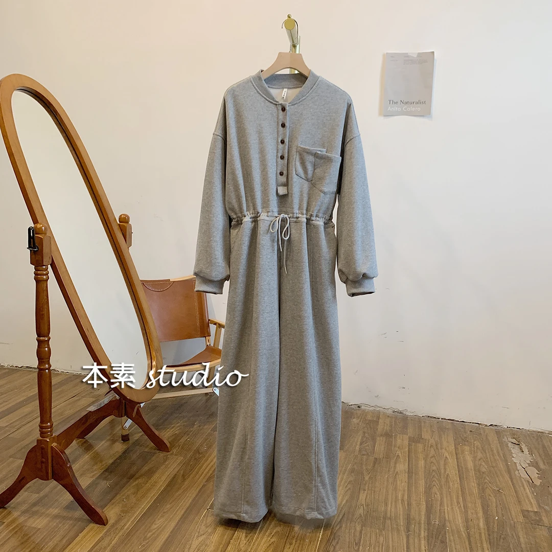 C1147半开扣腰部抽绳口袋装饰长袖连体裤