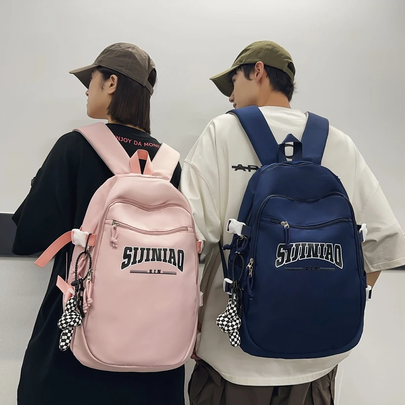 新款学生书包韩版大容量休闲旅行包电脑包初中生大学生时尚双肩包