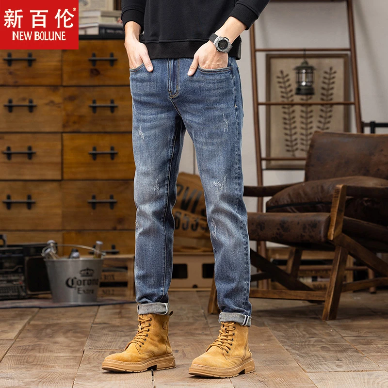 新百伦牛仔裤子男士秋冬时尚潮牌休闲裤男款水洗刮烂修身直筒长裤