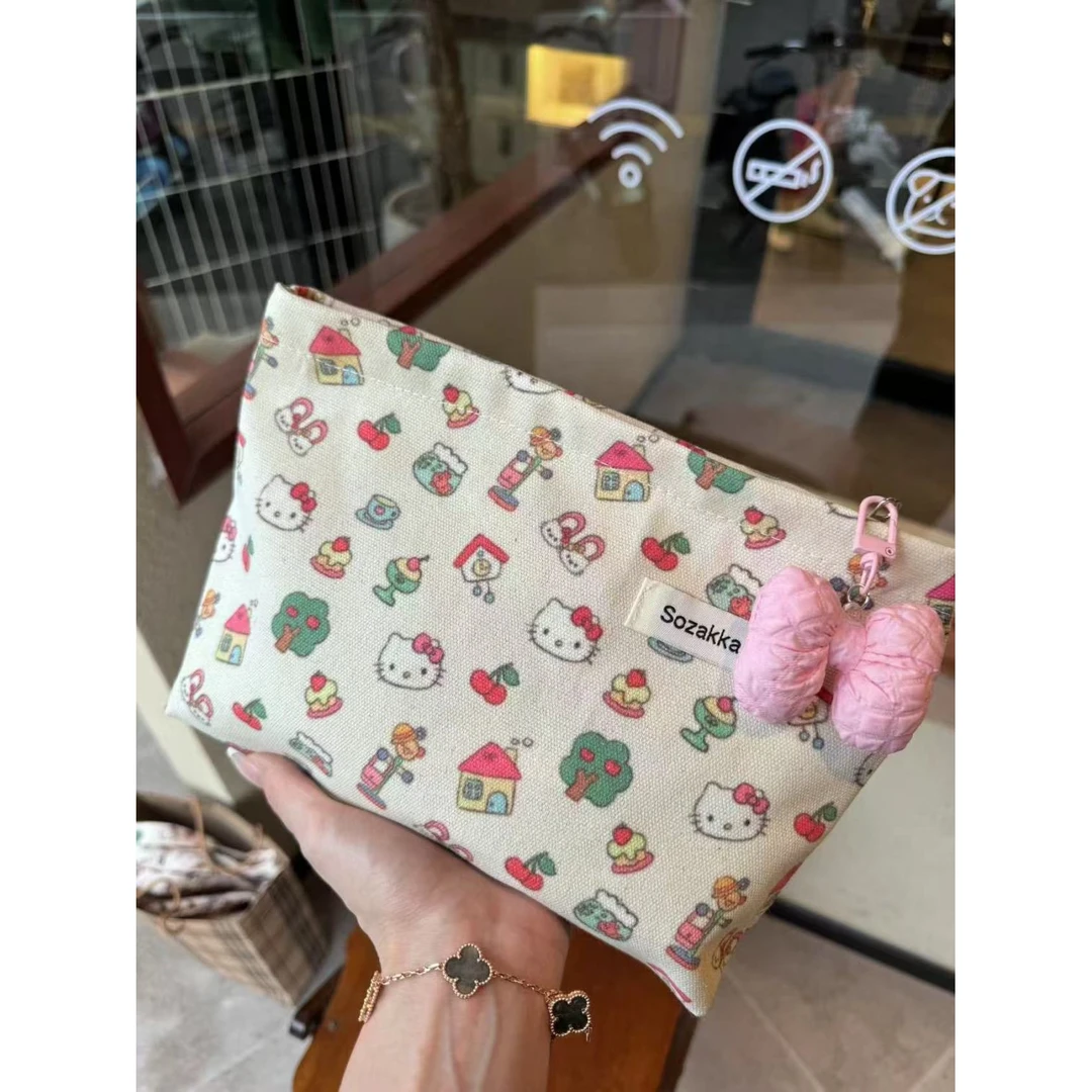 新款Kitty印花手拿包假期版大容量小众开学季便携百搭高颜值爆款