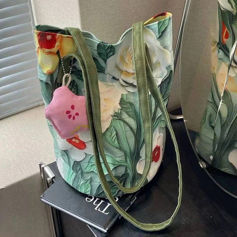 2024新外出手拎包油画花卉小众高级感单肩布包女大容量通勤水桶包