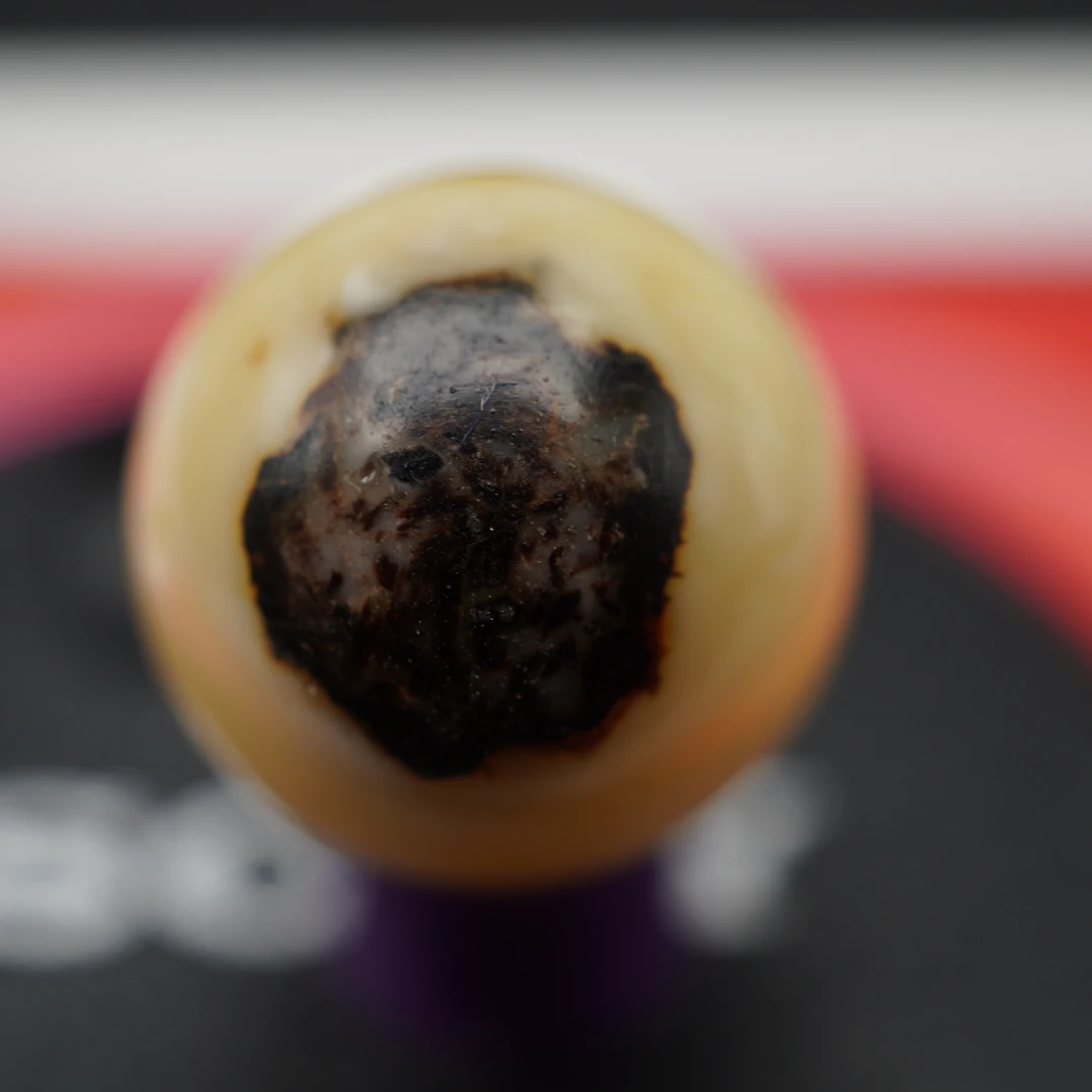 孤品15.1直径瑕疵蜜蜡珠有植物包裹物皮纹气泡坑表面光滑 编号314