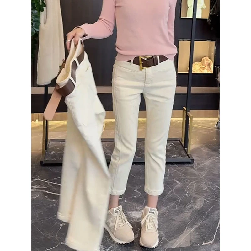 飞芊娅秋冬新款加绒加厚高腰显瘦烟管裤女大码梨形身材直筒牛仔裤