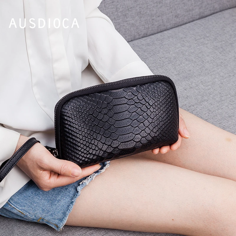 澳迪佳真皮手拿包包女手机包压纹休闲百搭小手抓包钱包多卡位隔层