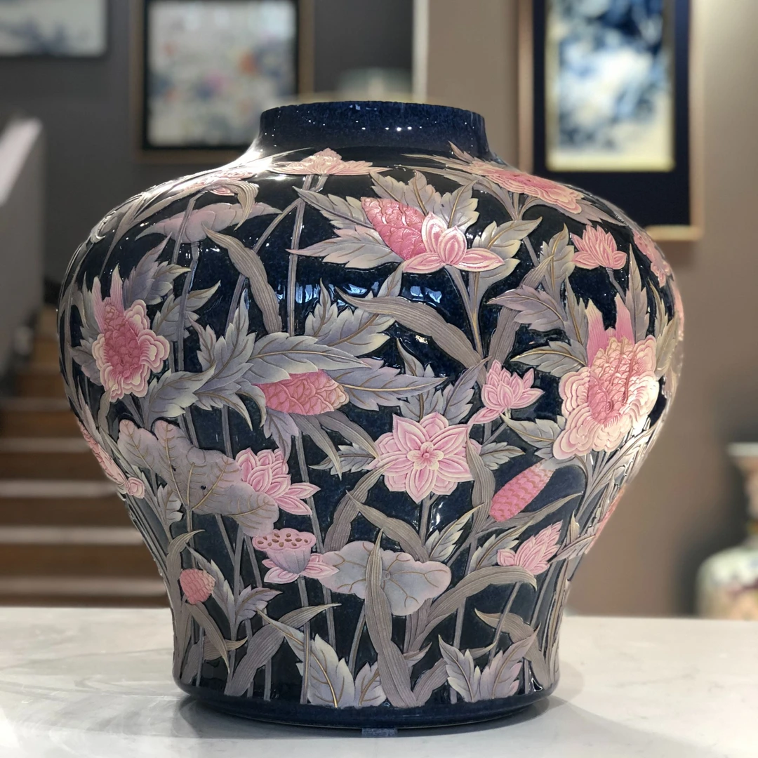 洒蓝雕刻花卉圆融罐