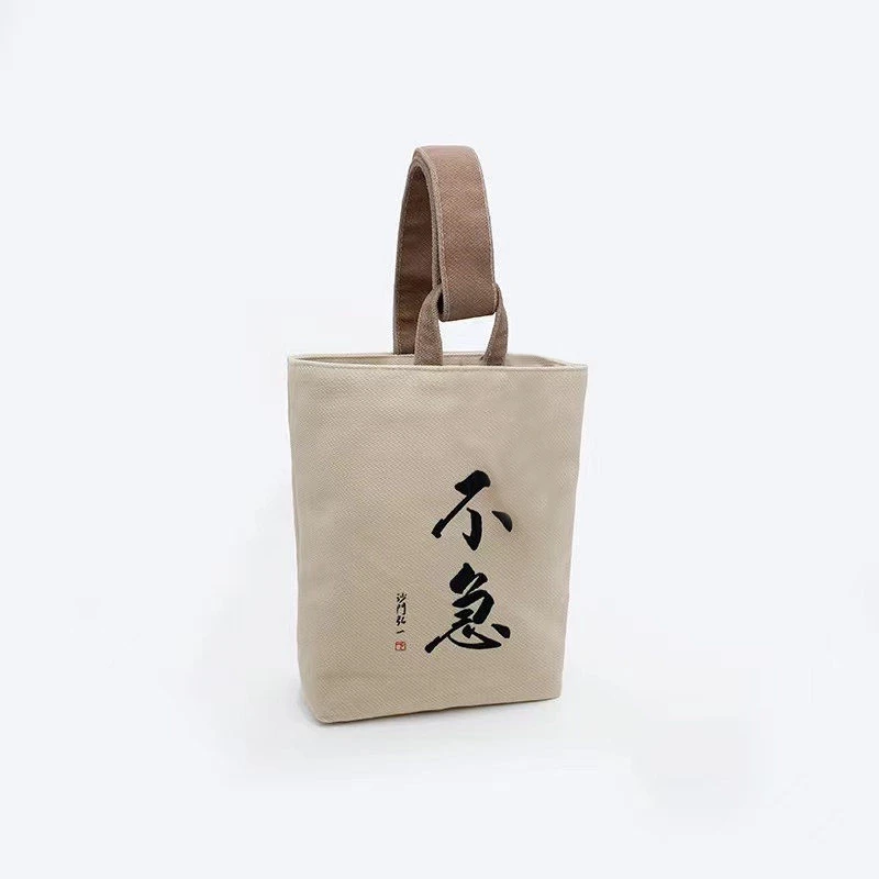 中国风高颜值复古水桶帆布包2023新款便携式上班外出手提小拎包女