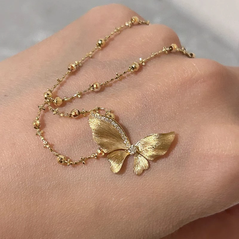 钛钢项链 古法金色拉丝蝴蝶吊坠项链复古轻奢微镶锆石锁骨链女