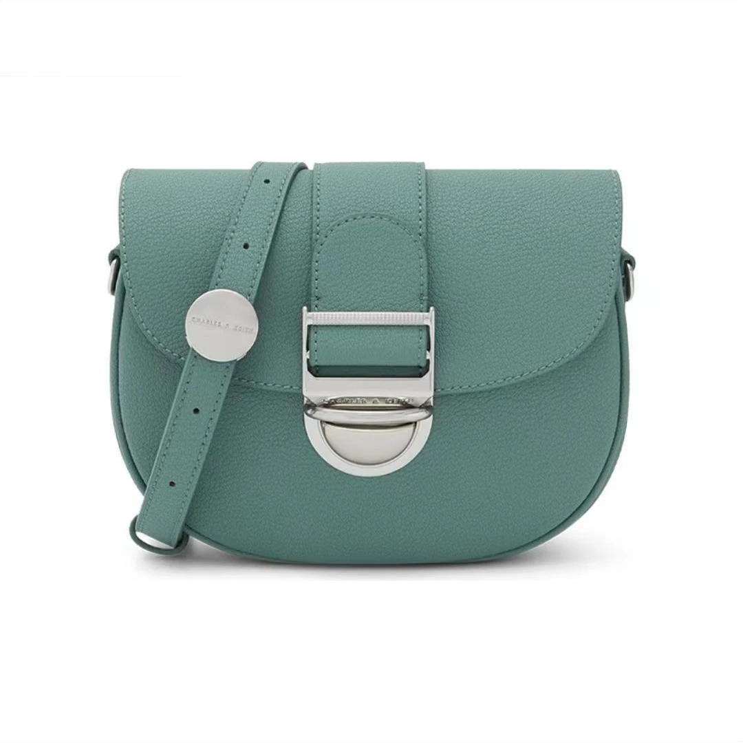 全新未使用 CHARLES & KEITH 孔雀绿马鞍包/30325/姐妹花