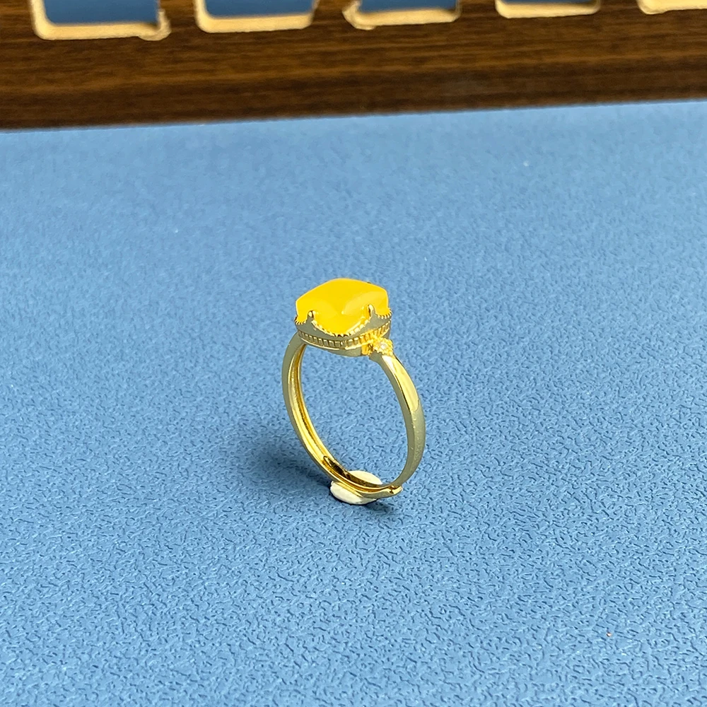 S925银镶嵌天然俄料琥珀蜜蜡皇冠女款精致戒指可调节