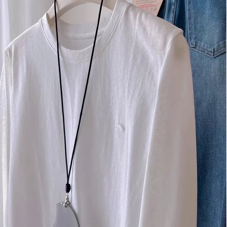 时尚万搭白色雪花棉贝母扣长袖打底衫